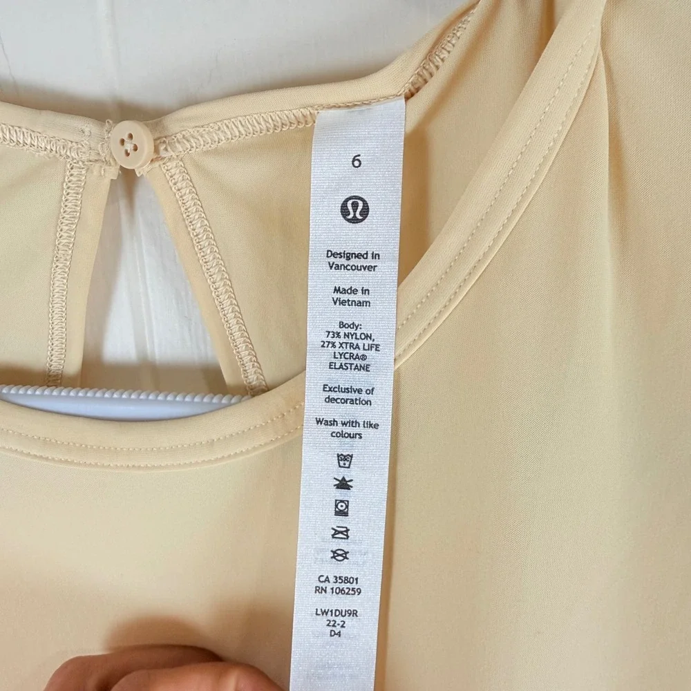 Lululemon Lightweight High Neck Romper Size 6 Tan Short Sleeve Open Back Pockets